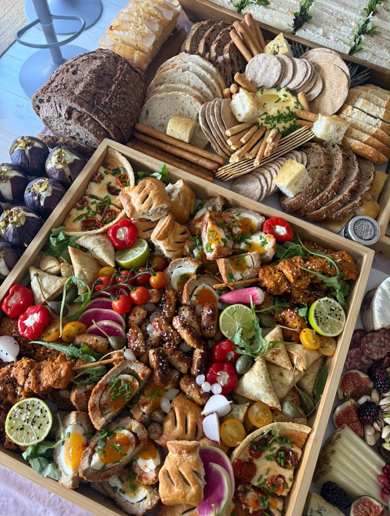 A picky bits box with scotch eggs, sausage rolls and savoury bites